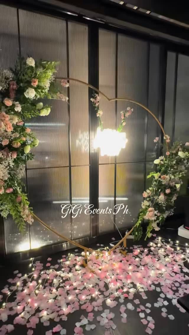 Gold heart floral arch wedding decoration by GiGi Events Ph